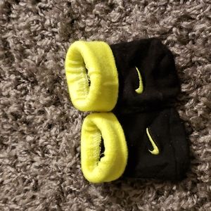 Neon green and black nike baby socks
